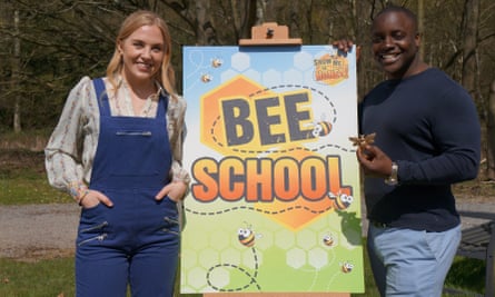 Presenter Maddie Moate with professional beekeeper Curtis Thompson.