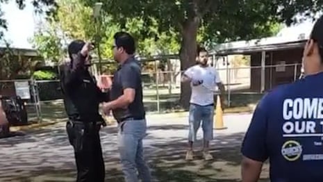 'Our kids are in there': parents yell at police to enter Texas school – video
