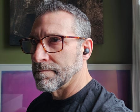 A pair of Sony WF-1000XM5 earbuds