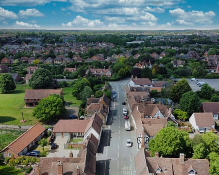 A drone shot of a high street of a Tudor village