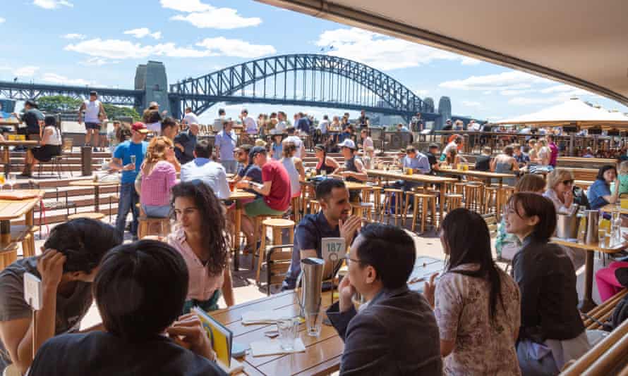 Diners seen outside near the Sydney Harbour Bridge