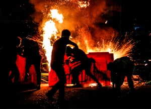 Cúcuta, Colombia: Demonstrators set a barricade on fire during a protest against police brutality on the Colombian border with Venezuela. At least 10 people were killed and hundreds wounded after rioting broke out in the capital, Bogotá , during protests over the death of a man repeatedly tasered by police