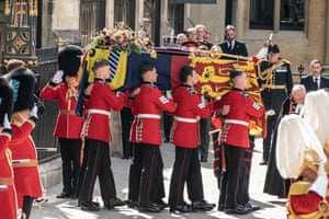 The Queen’s coffin leaves Westminster Abbey