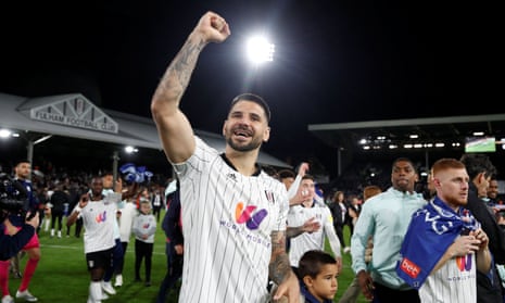 Aleksandar Mitrovic celebrates after his 39th and 40th goals of the season secured promotion for Fulham.