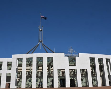 The flagpole and the exterior of Parliament House in Canberra