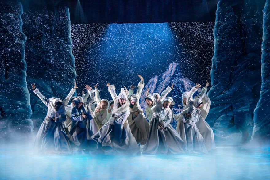 The cast perform in a whiteout.