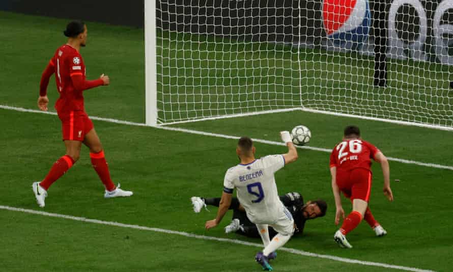 Real Madrid’s Karim Benzema sticks the ball into the net but is denied by VAR.
