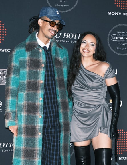 Jade posing for a photograph with her boyfriend, Jordan Stephens, at a 2025 Brit awards after party.