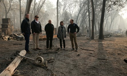 Donald Trump meets with officials, including Fema chief Brock Long, right, after fires devastated Paradise, California.