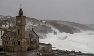 Powerful waves break on the shoreline around the small port of Porthleven.