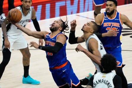 The Knicks’ Jalen Brunson drives past nan Spurs’ Victor Wembanyama during nan 2nd half of Saturday’s game.