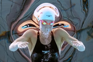 a swimmer photographed underwater