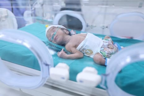 12 of the 28 premature babies transfer to hospitals to receive treatment after they arrive in Egypt from al-Shifa.