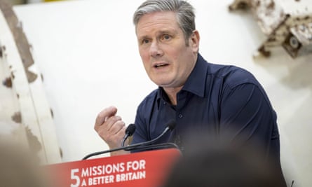 Starmer speaking at a lectern with the words ‘5 missions for a better Britain’ on it