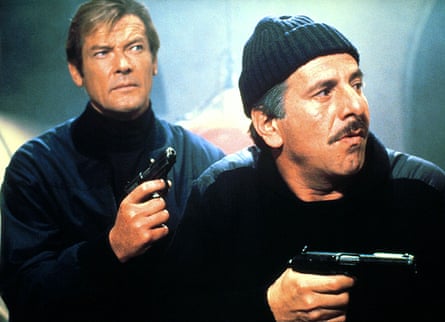 Chaim Topol with Roger Moore (left) in James Bond film For Your Eyes Only.