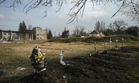 Graves in the yard of a hospital in Siversk, Donbas region.