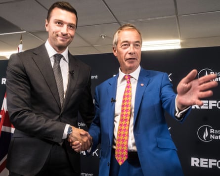 Jordan Bardella and Farage shaking hands