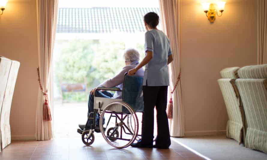 A resident and staff member at a nursing home