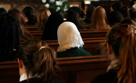 Girls from St Marylebone School, London attending a multi-faith assembly in church