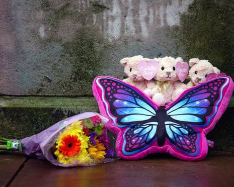 Tributes to the victims of the Southport killings left outside Liverpool crown court, where Axel Rudakubana was to be sentenced on 23 January 2025.