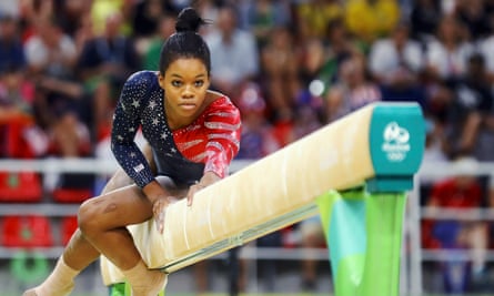 Gabby Douglas competes on the beam during the 2016 Rio Olympics.