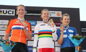 Amalie Dideriksen wears the winner’s rainbow jersey, alongside silver medallist Kirsten Wild (left) and bronze medallist Lotta Lepisto (right).