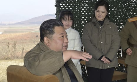  Kim Jong Un, his wife Ri Sol Ju, and daughter Ju Ae