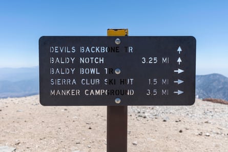 A mountain of trouble? The draw – and danger – of California’s Mount Baldy Trail signs on the summit of Mt Baldy.