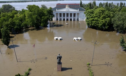 A view shows the House of Culture on a flooded street in Nova Kakhovka after the nearby dam was breached.