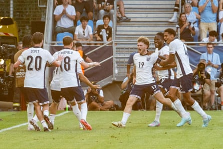 Harvey Elliott celebrates with teammates after scoring what proved the winner against the Netherlands in the semi-final.