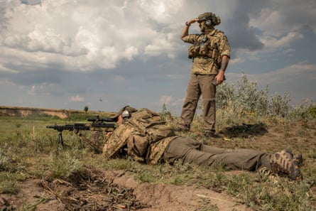 Alan, a British fighter, and Steve, the American one, who both joined the Da Vinci Wolves group, at a shooting range outside Dnipro