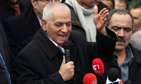 A file picture of Houcine Abassi, secretary general of the Tunisian General Labor Union, speaking to supporters.