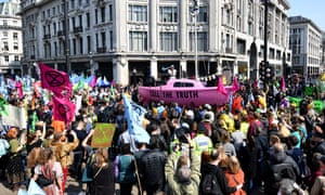 A boat is placed in the centre of Oxford Circus during the Extinction Rebellion protest in London.