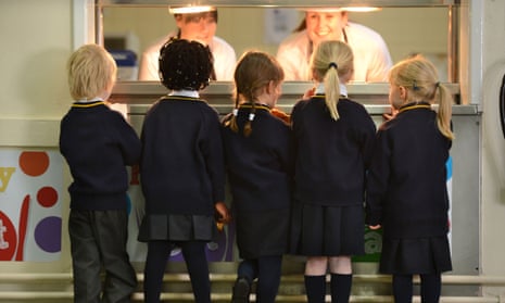 Schoolchildren queuing for food
