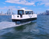 An electric ferry on the water