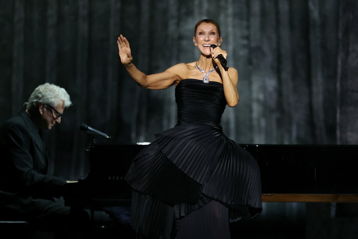 Dion performs during her first concert of a series at the Plenitude Arena in Nanterre, west of Paris on 12 September.
