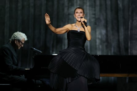 Dion performs during her first concert of a series at the Plenitude Arena in Nanterre, west of Paris on 12 September.