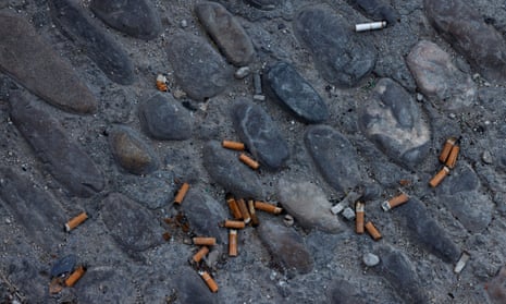 Cigarette butts outside a pub in Ronda, Spain.