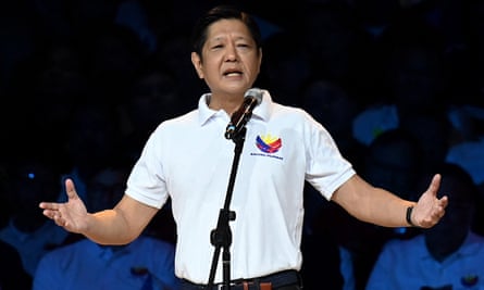 Ferdinand Marcos Jr speaks with arms outstretched