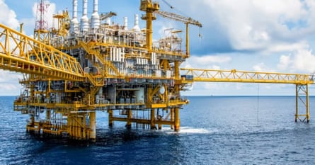 An oil rig in the sea.
