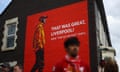 Mural of Liverpool manager Juergen Klopp outside the stadium before the match.