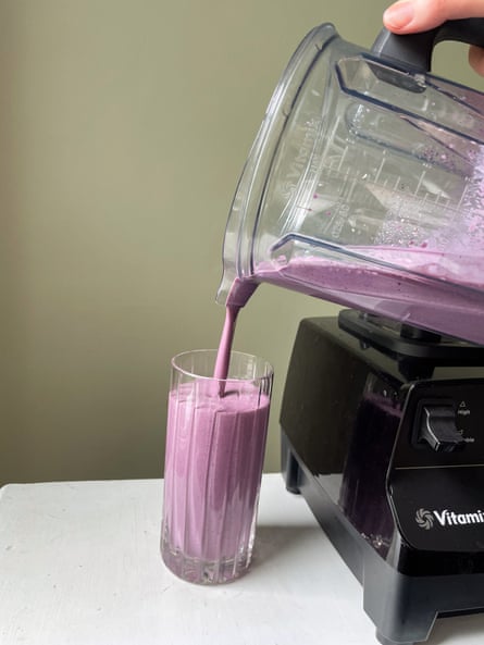 a smoothie from a Vitamix 5200 blender being poured into a glass