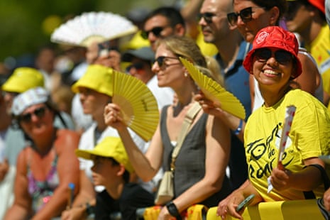 Spectators line the route at the start of the race