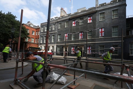 Scaffolders at work in Downing Street.