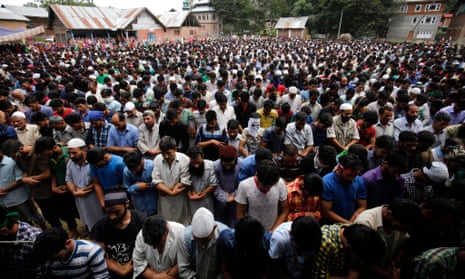 Hundreds of people attend the funeral of four civilians killed in Aaripanthan village on Tuesday.