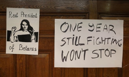 Posters are seen on a wall at an event where Tsikhanouskaya was speaking in London