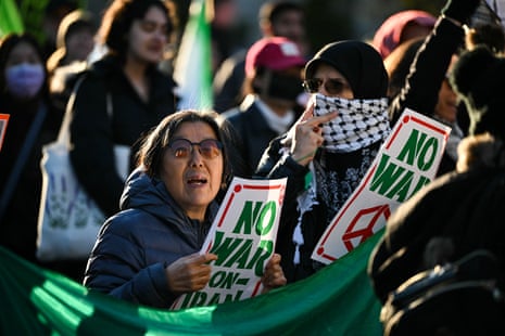 Protestors rally against US military action in Iran during a demonstration near the White House in Washington, DC, on April 7, 2026.