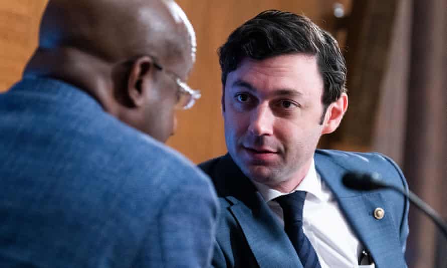 Warnock and Jon Ossoff, his fellow Georgia senator, speak during a congressional hearing.