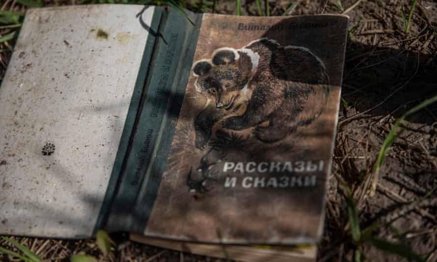 The copy of Tales and Fairytales, believed to have been abandoned by a soldier, lying in the grass at the camp.