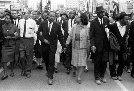Dr Martin Luther King Jr and other activists march in Alabama